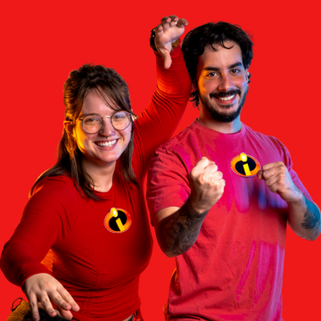 Female and Male wearing red shirts with a pixar patch sewed on