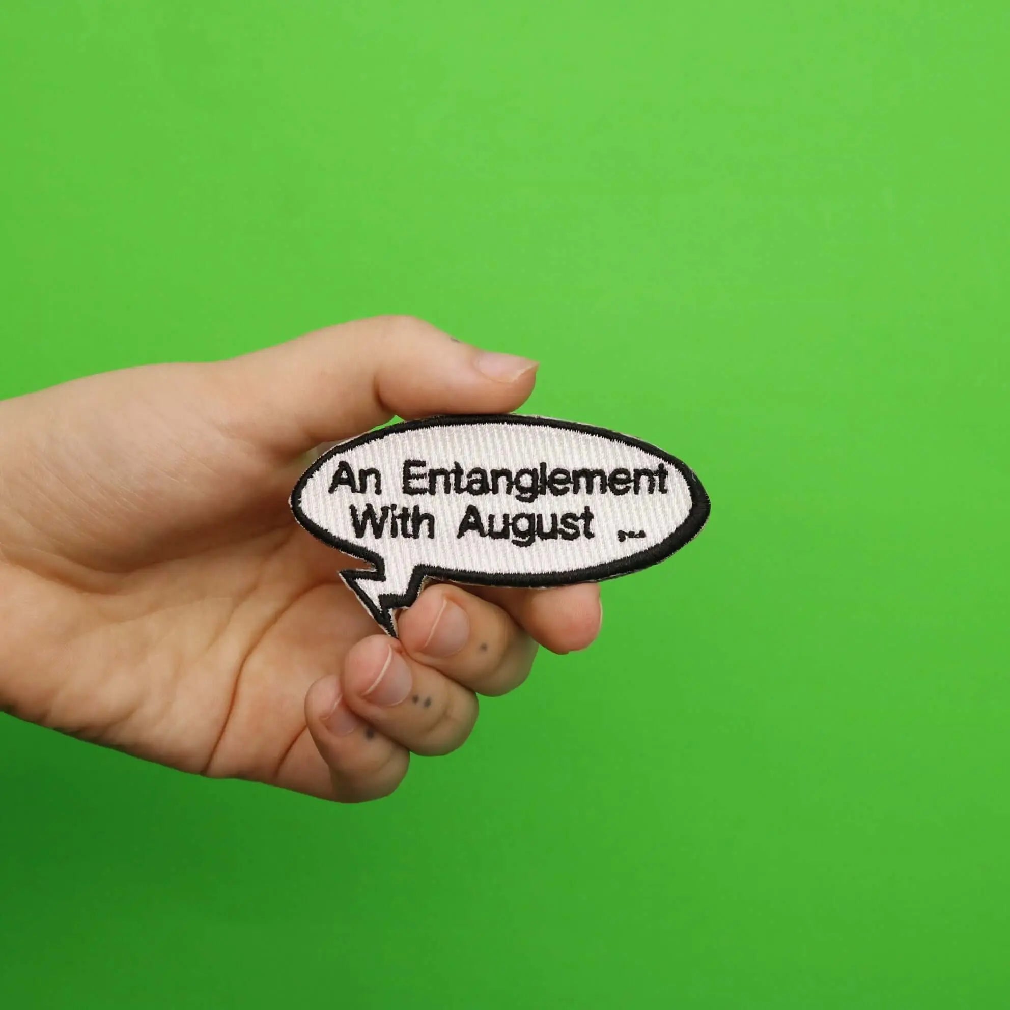 "An Entanglement With August..." Word Bubble Embroidered Iron On Patch