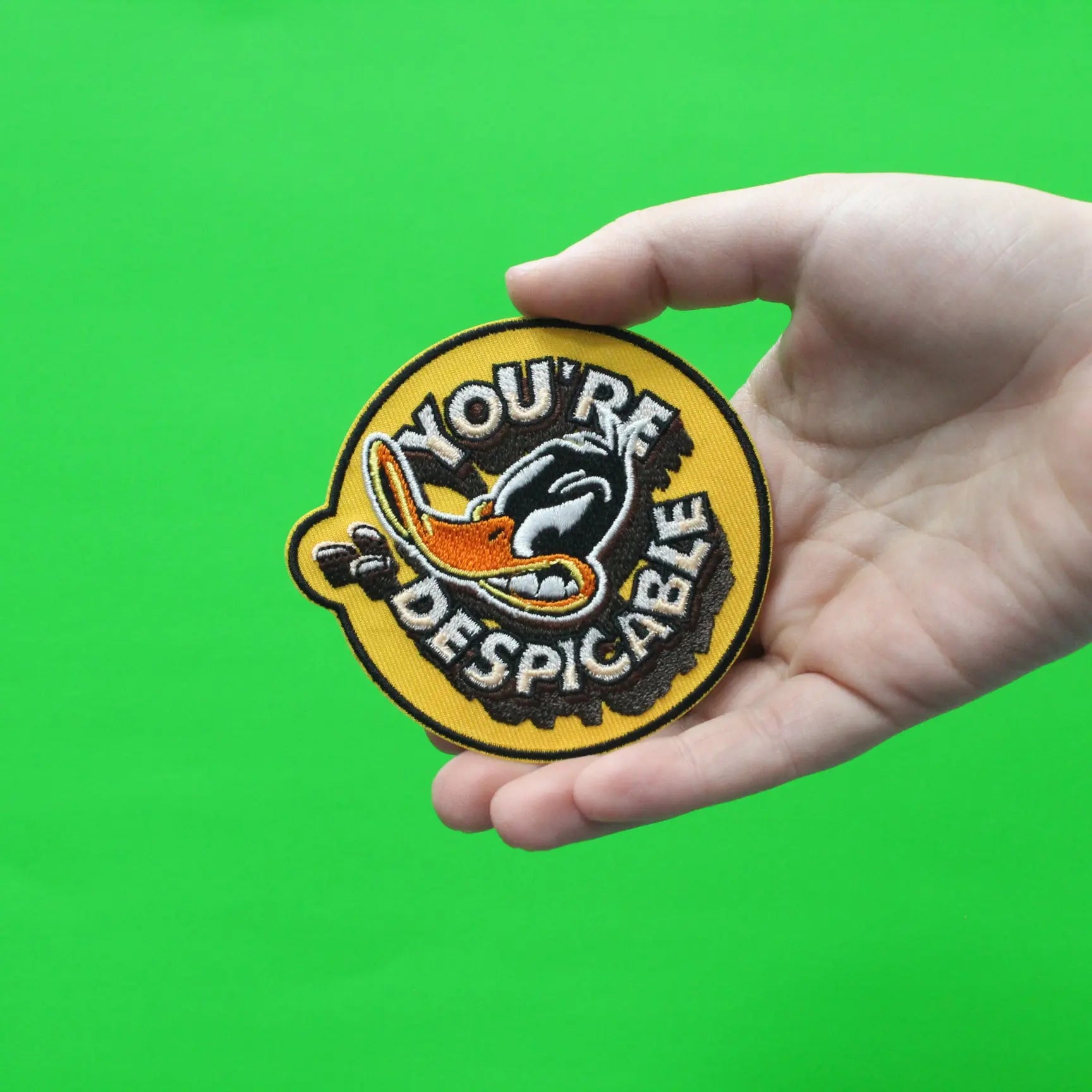 Official Daffy Duck You're Despicable Round Embroidered Iron On Patch