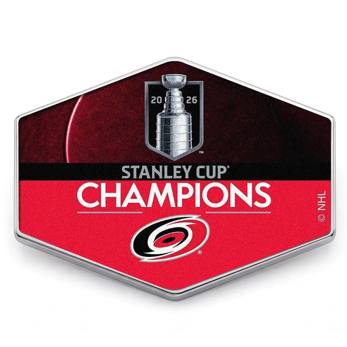Hexagonal badge with Stanley Cup Champions text and Carolina Hurricanes logo on a white background