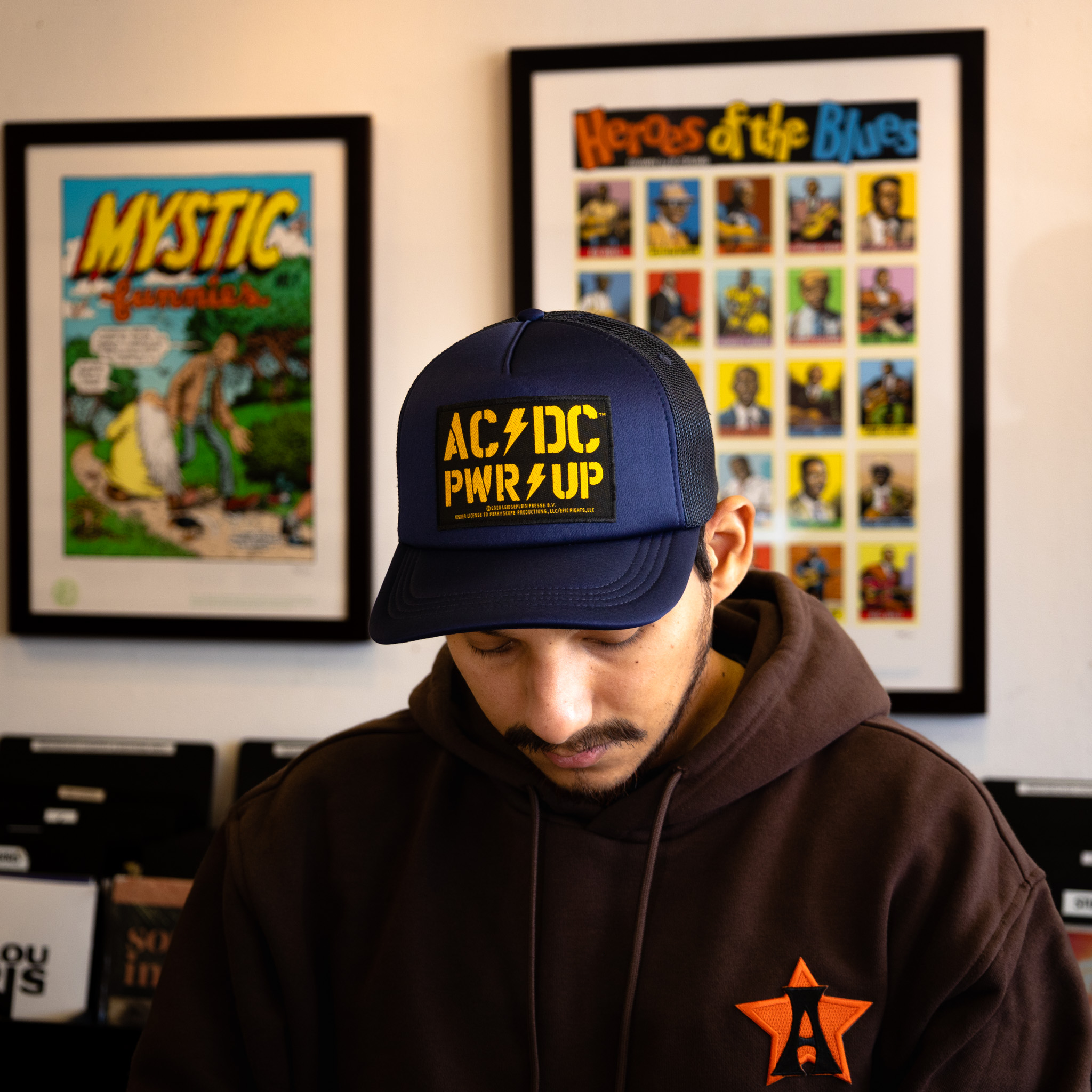 guy wearing an acdc hat patch
