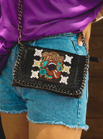 rolling stones patches on a purse
