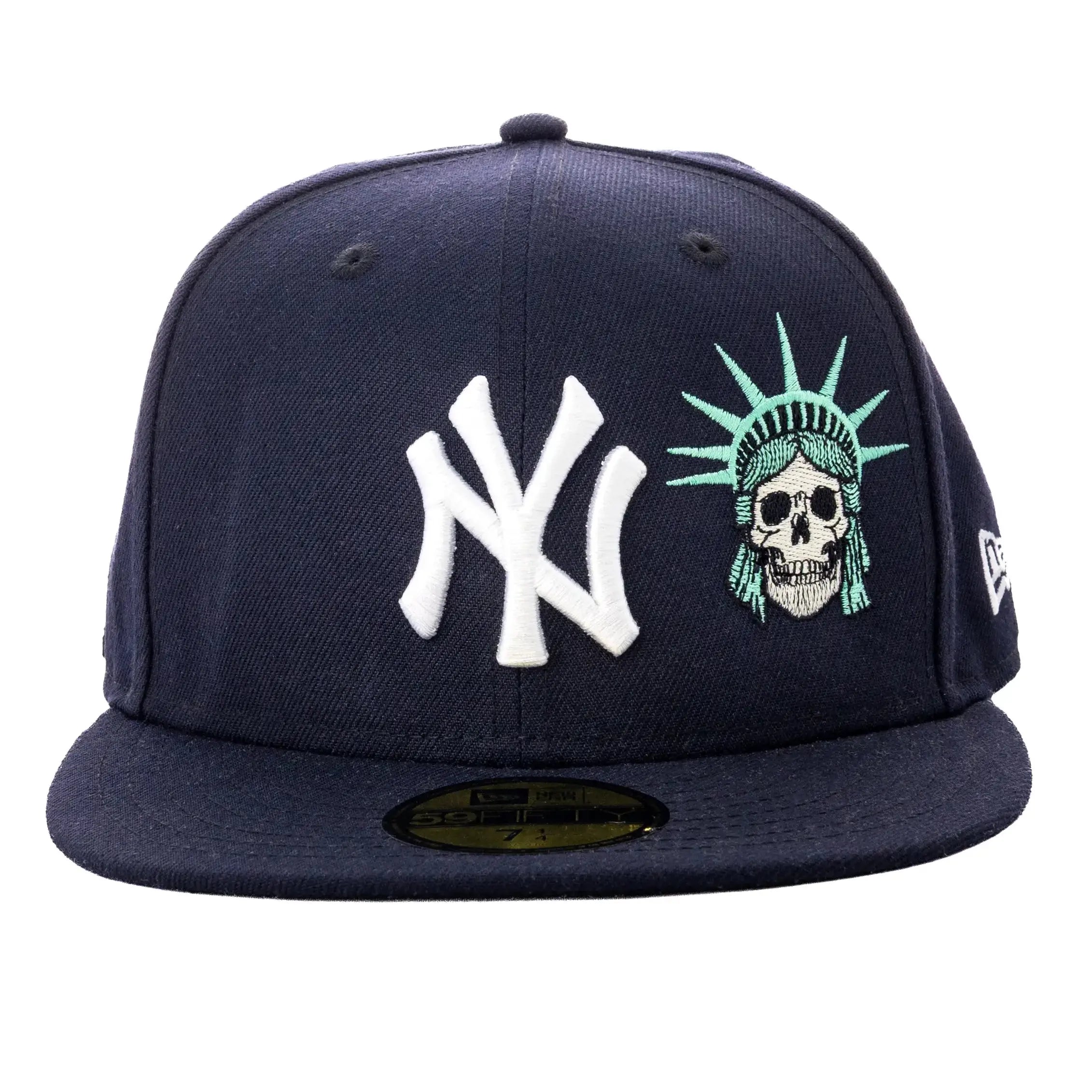 Navy blue cap with white logo and skull design on a white background