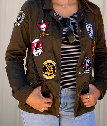 moview patches from top gun on a jacket