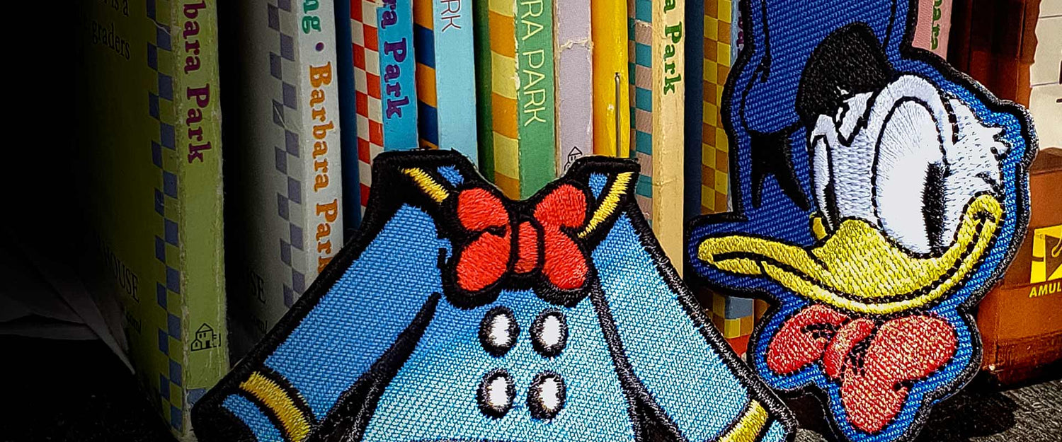 Donald Duck Shirt and Head Patch with Books in the Background