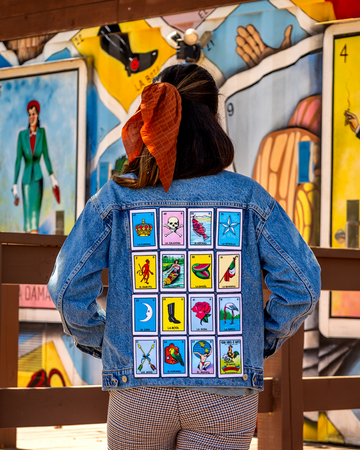 loteria patches on a denim jacket
