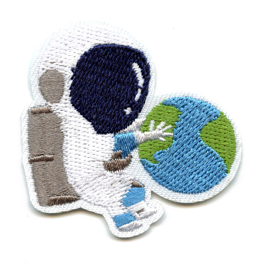 Small Blue Astronaut Hugging The Earth Embroidered Iron On Patch