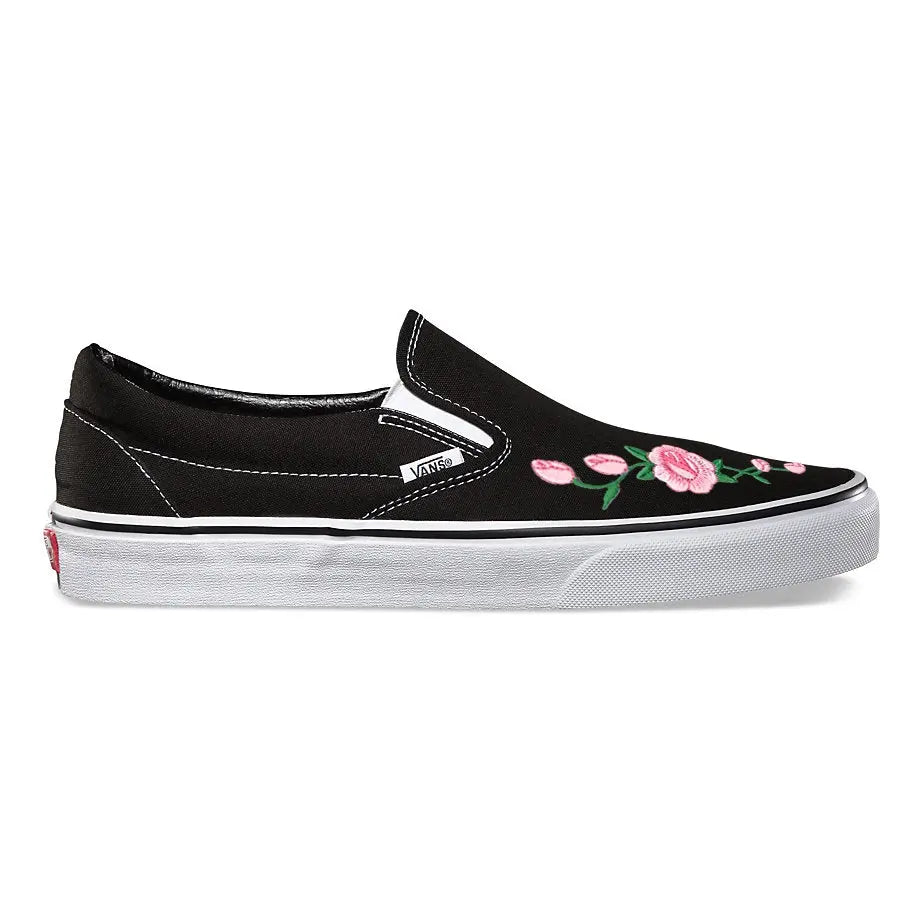 Black vans with roses on outlet them